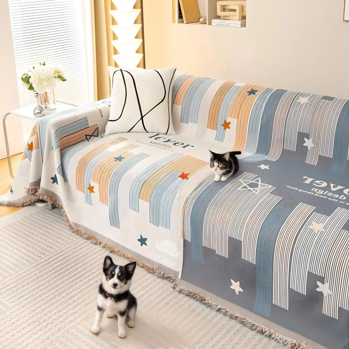 Gray anti-scratch sofa cover draped over a living room couch