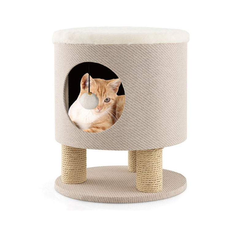 Cat sitting in the cat bed with scratch posts