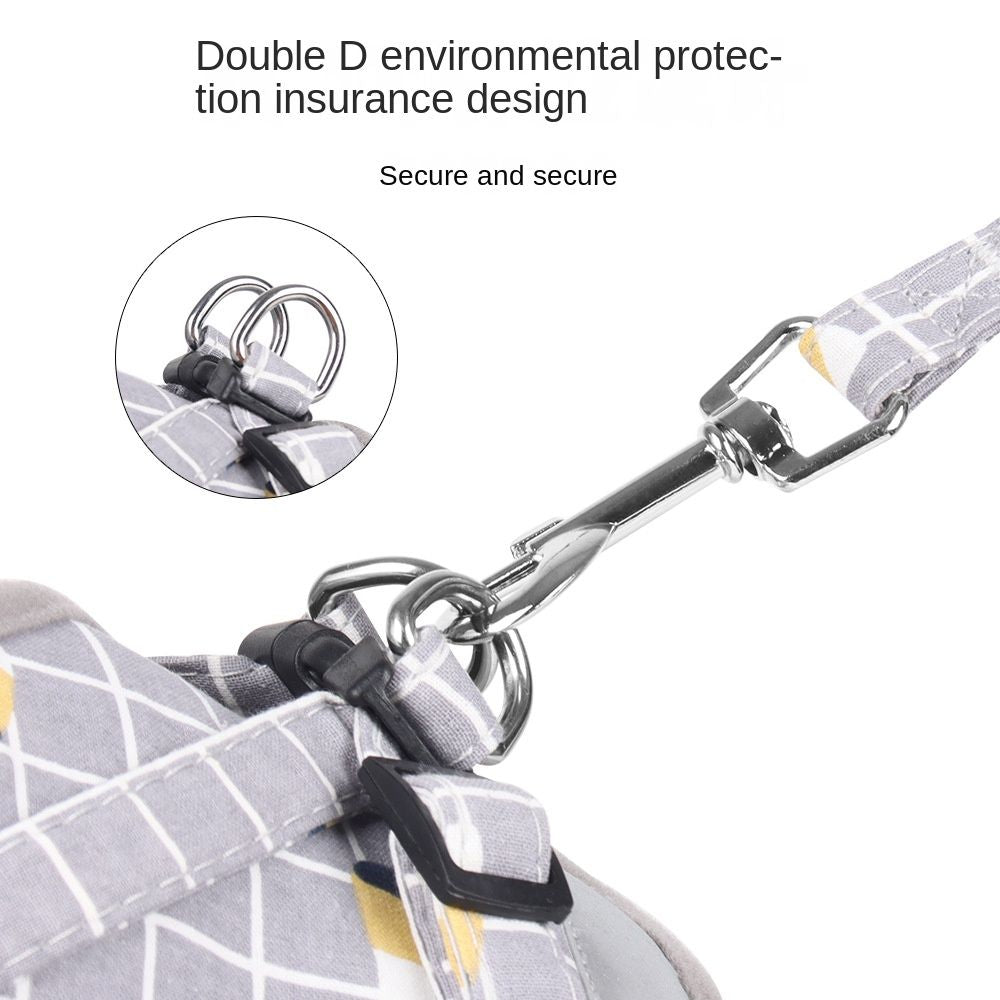 Leash clipped to D-ring on dog reflective harness