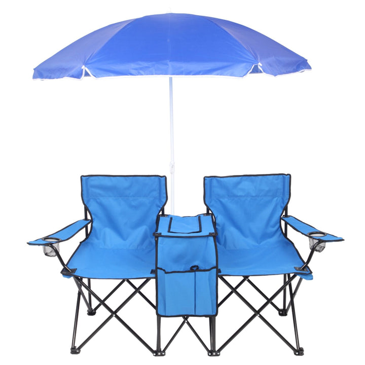 Two blue folding chairs joined by a center console with a shared umbrella and mesh cup holders in each armrest
