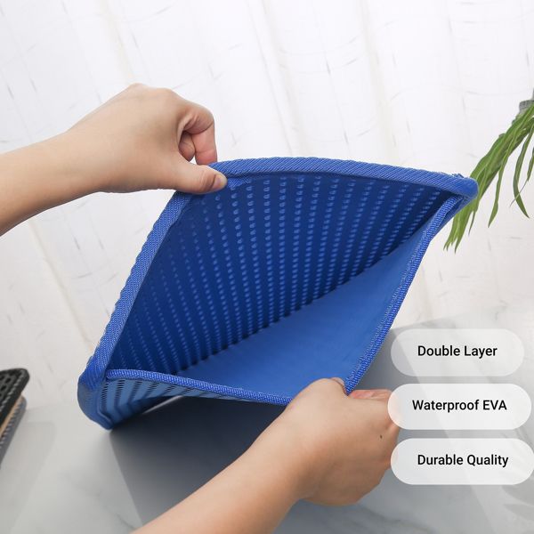 Litter mat showing the two-layer trap design