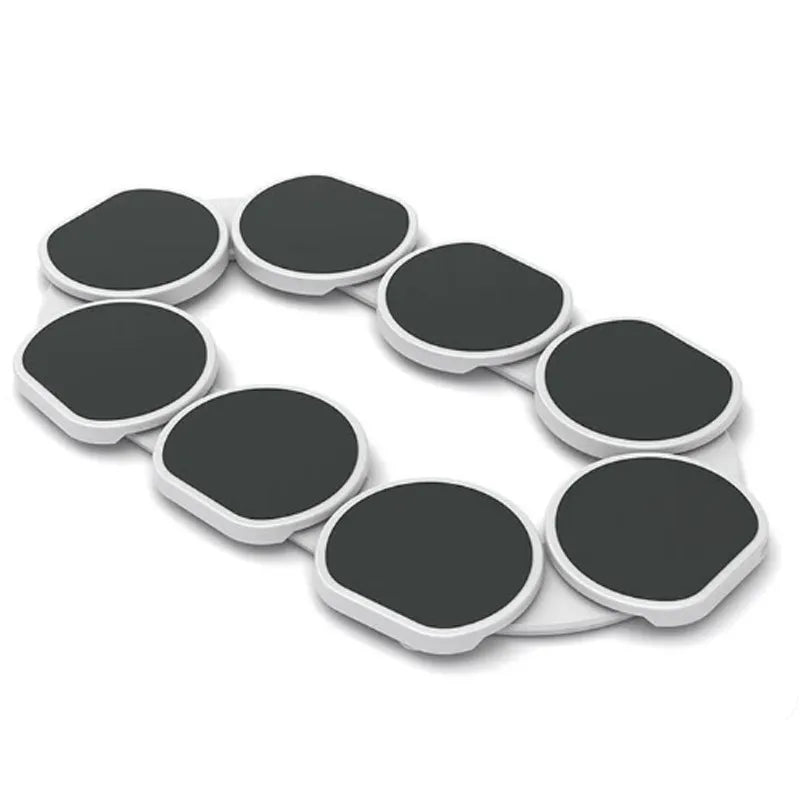 Eight connected turntable discs shown empty in an oval ring