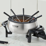 Electric fondue pot set with the 3 quart pot at center surrounded by its 8 included forks
