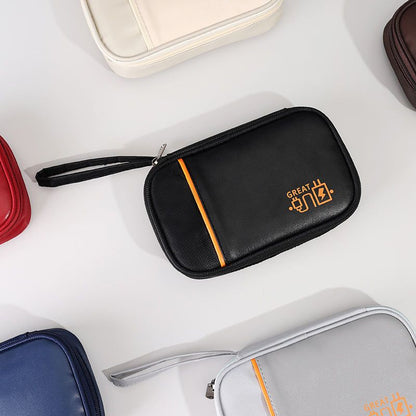 Cable organizer pouch opened to show elastic loops and compartments