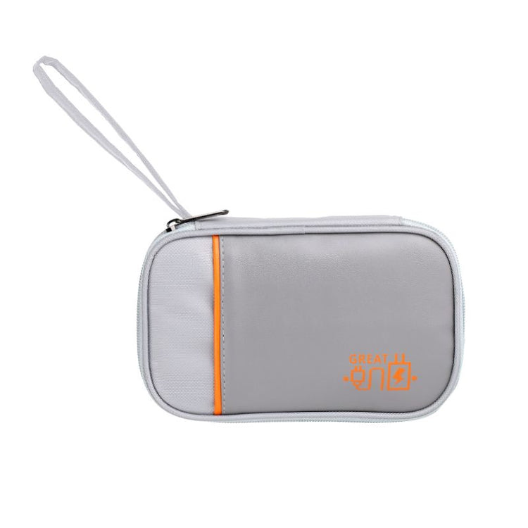 Cable organizer bag holding chargers, cords, and tech accessories