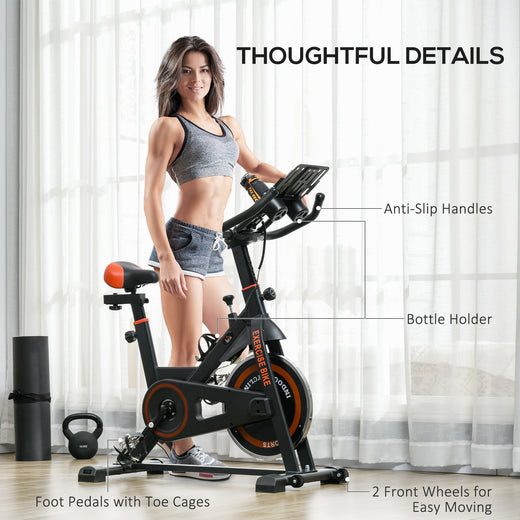 Person riding the home exercise bike for cardio