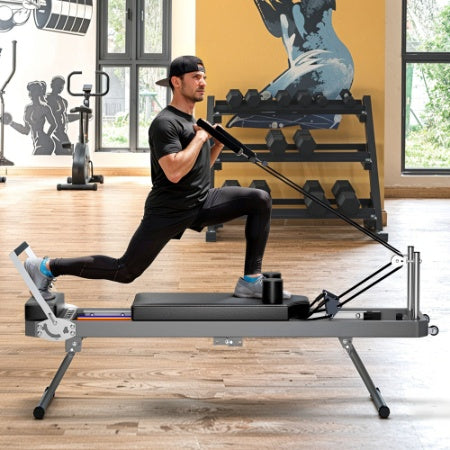 Pilates reformer machine in black