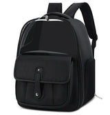 Black PU leather cat backpack carrier shown from the side with the window closed