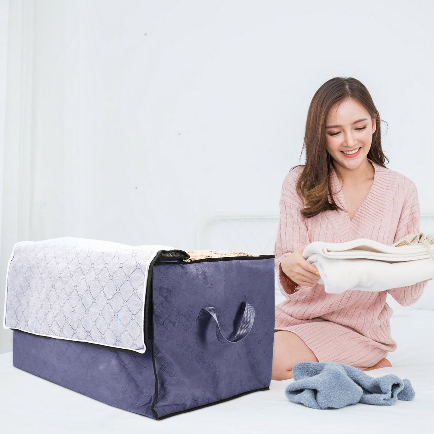 Foldable clothes storage bag size reference shot