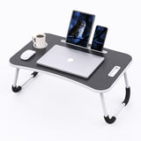 Laptop bed table shown from an angled view
