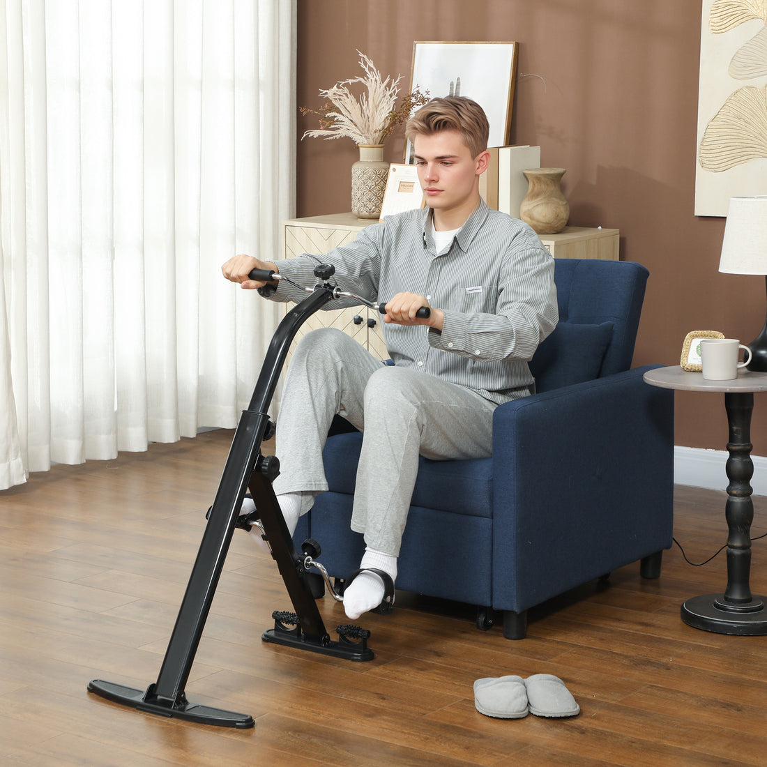 Foldable pedal exerciser with LCD monitor on the front