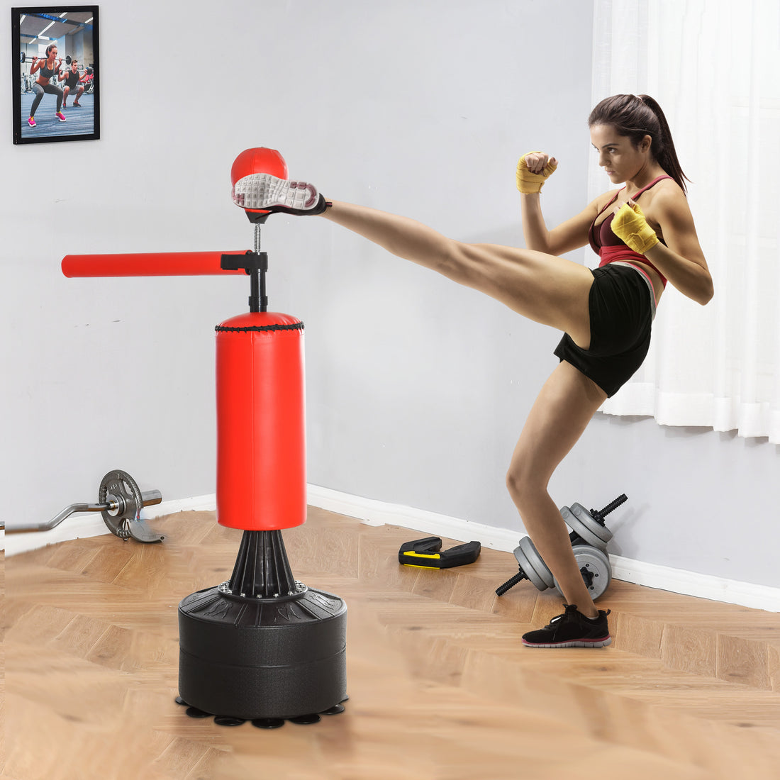 Black and red freestanding boxing bag with gloves