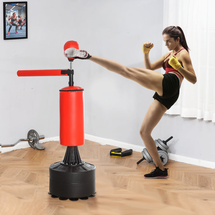 Black and red freestanding boxing bag with gloves