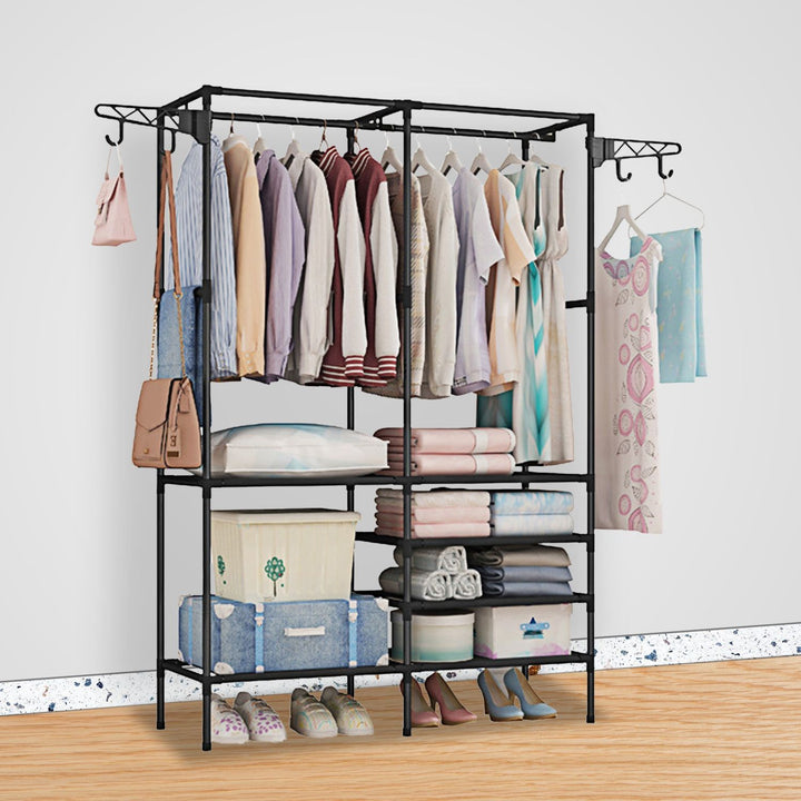 Freestanding metal garment rack with hanging bar and lower shoe shelves