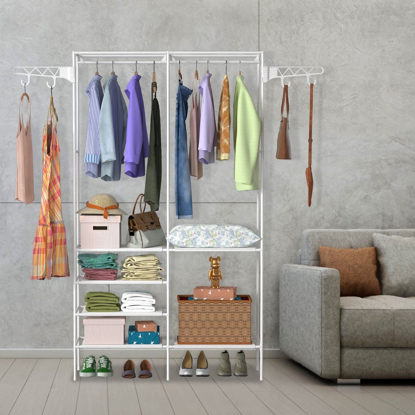 Freestanding garment rack with hanging clothes and shoes