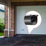 Black rubber tubular door seal fitted into an aluminum track along a white sectional garage door