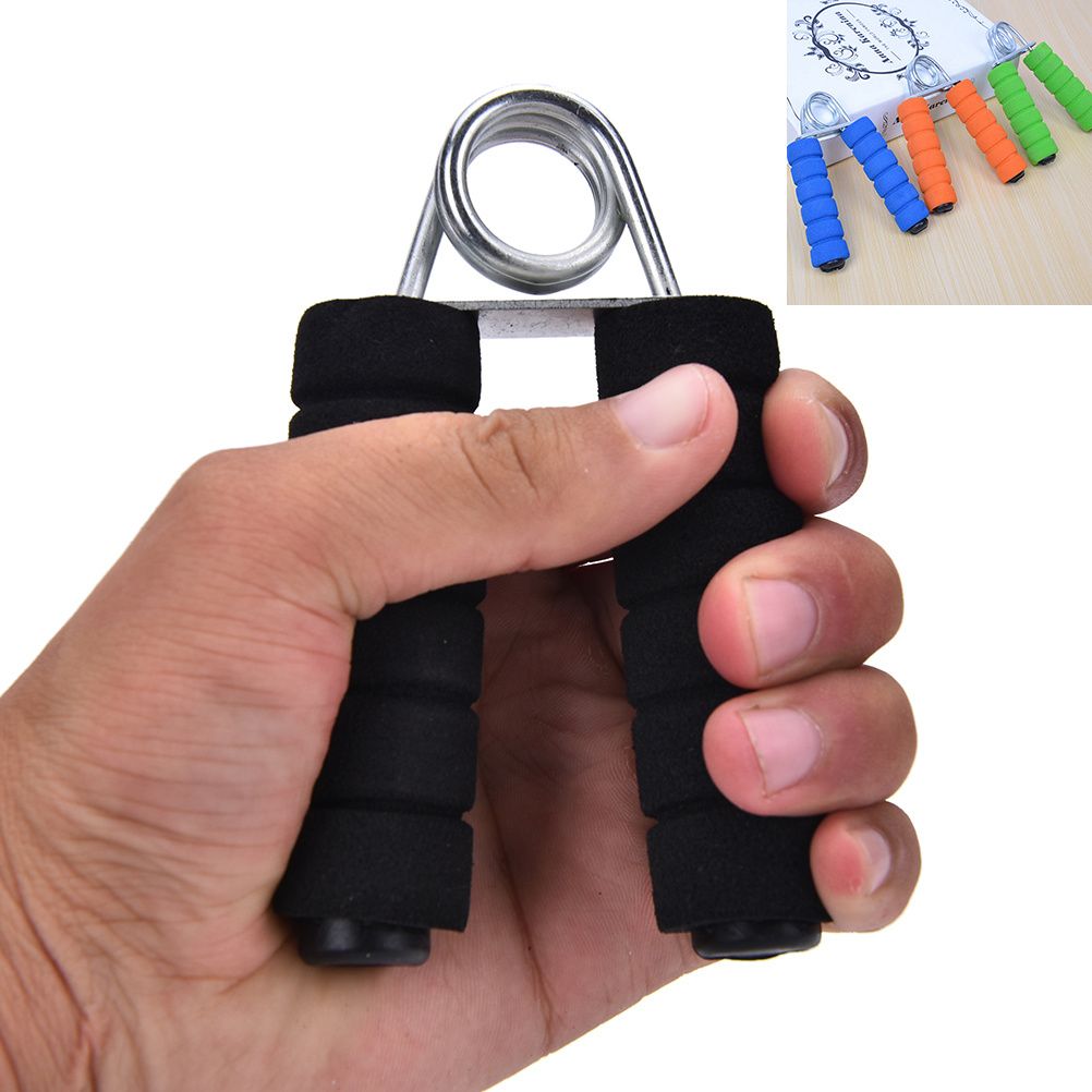 Hand grip strengthener shown in use during a grip training rep
