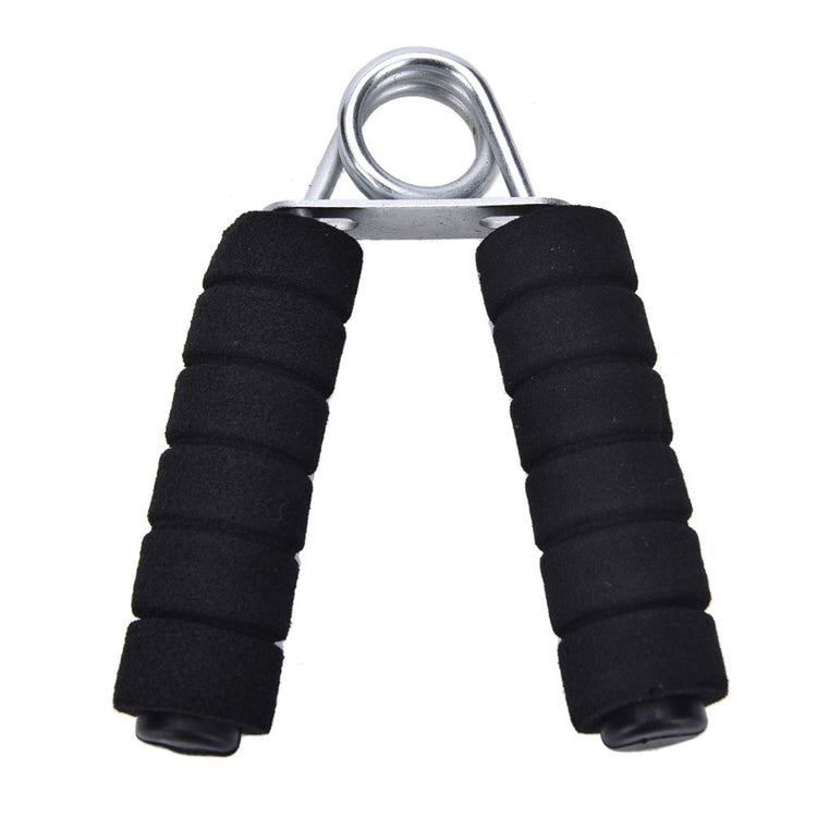 Hand grip strengthener compact size view next to a hand