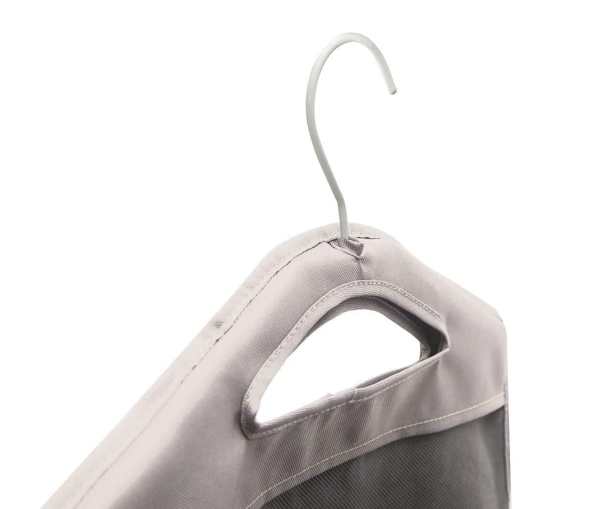 Hanging hamper with dirty clothes inside a bedroom closet