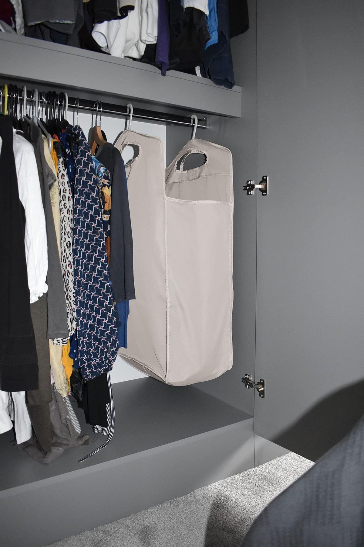 Hanging laundry hamper in a small dorm closet