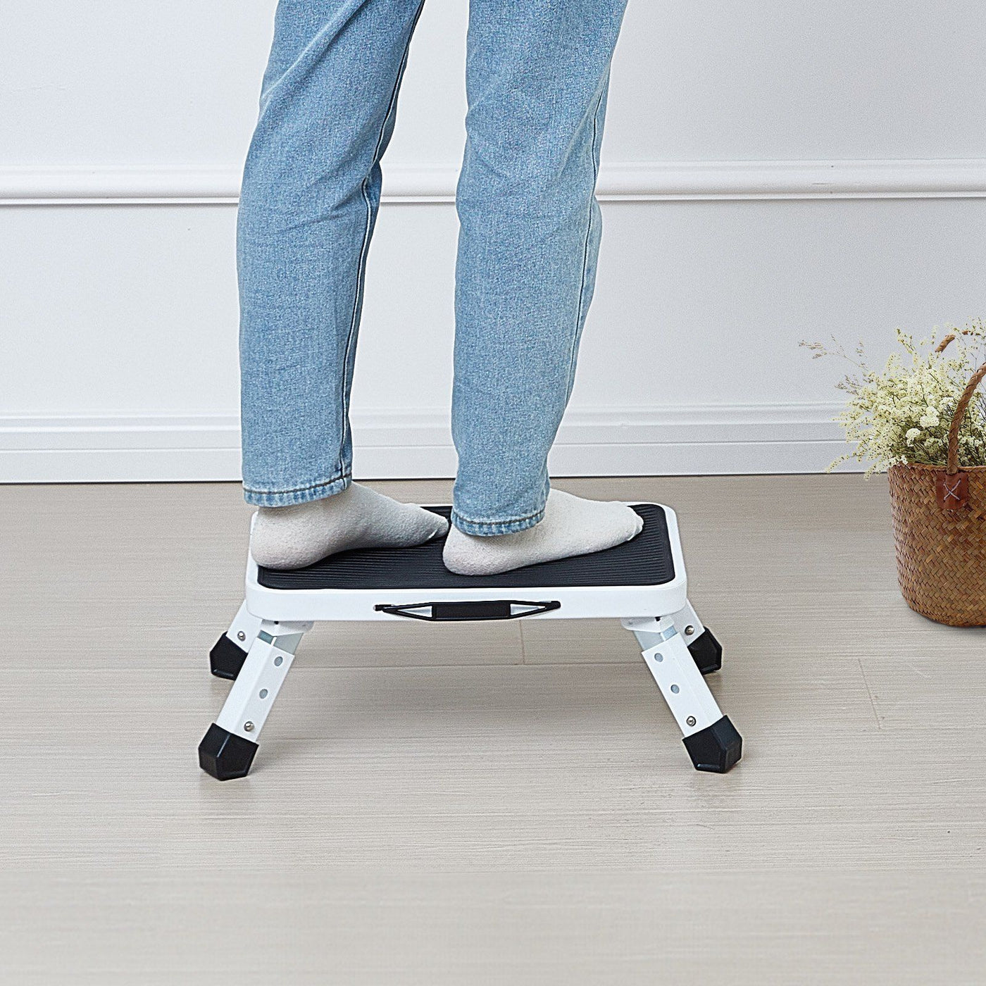 1-step foldable stool stored behind a door