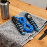 Jump rope with digital counter and non-slip handles