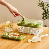 Machine shown dispensing finished ice cubes into the storage scoop