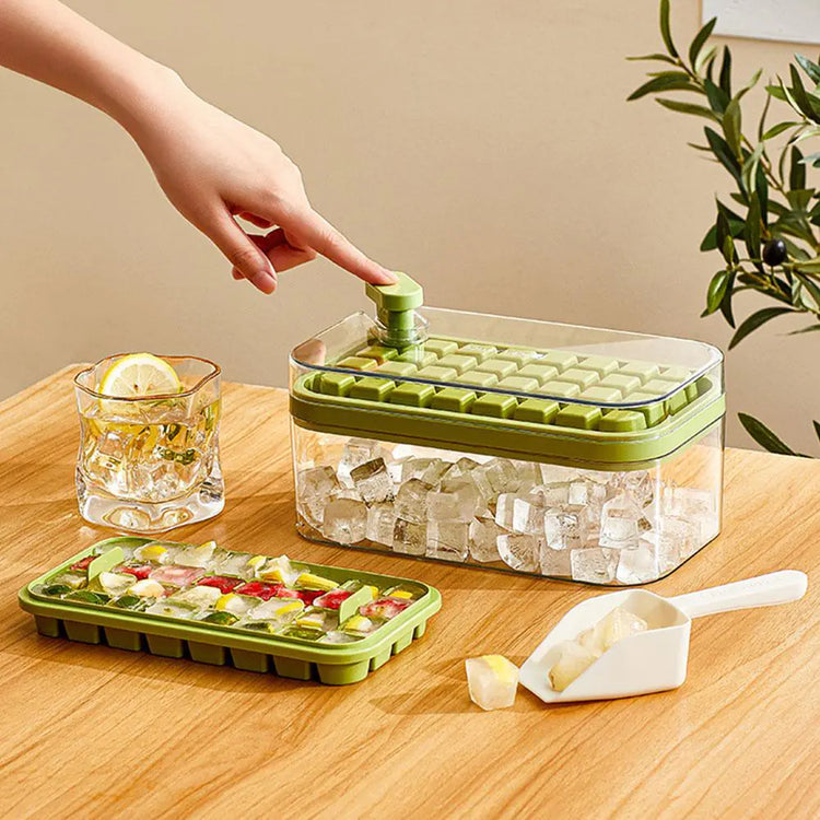 Machine shown dispensing finished ice cubes into the storage scoop