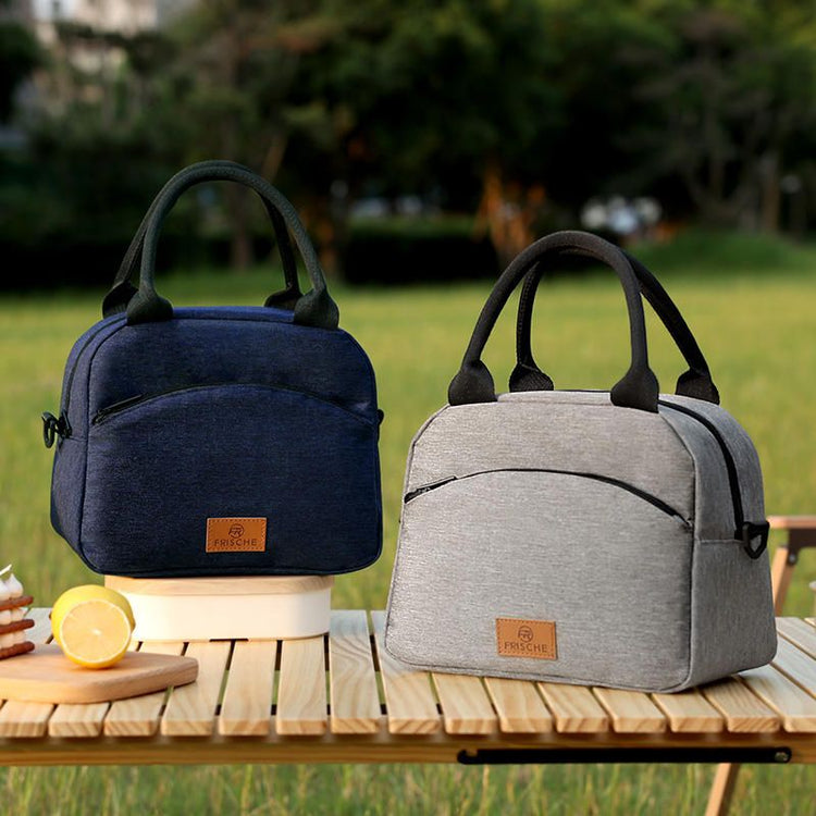 Insulated cooler bag with carry handles, side profile