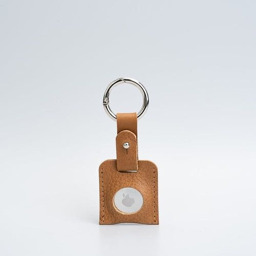 Leather AirTag keychain holder case, front view in Brown