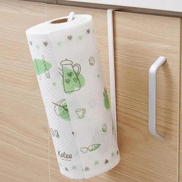 Paper towel holder standing on a kitchen countertop with a roll loaded