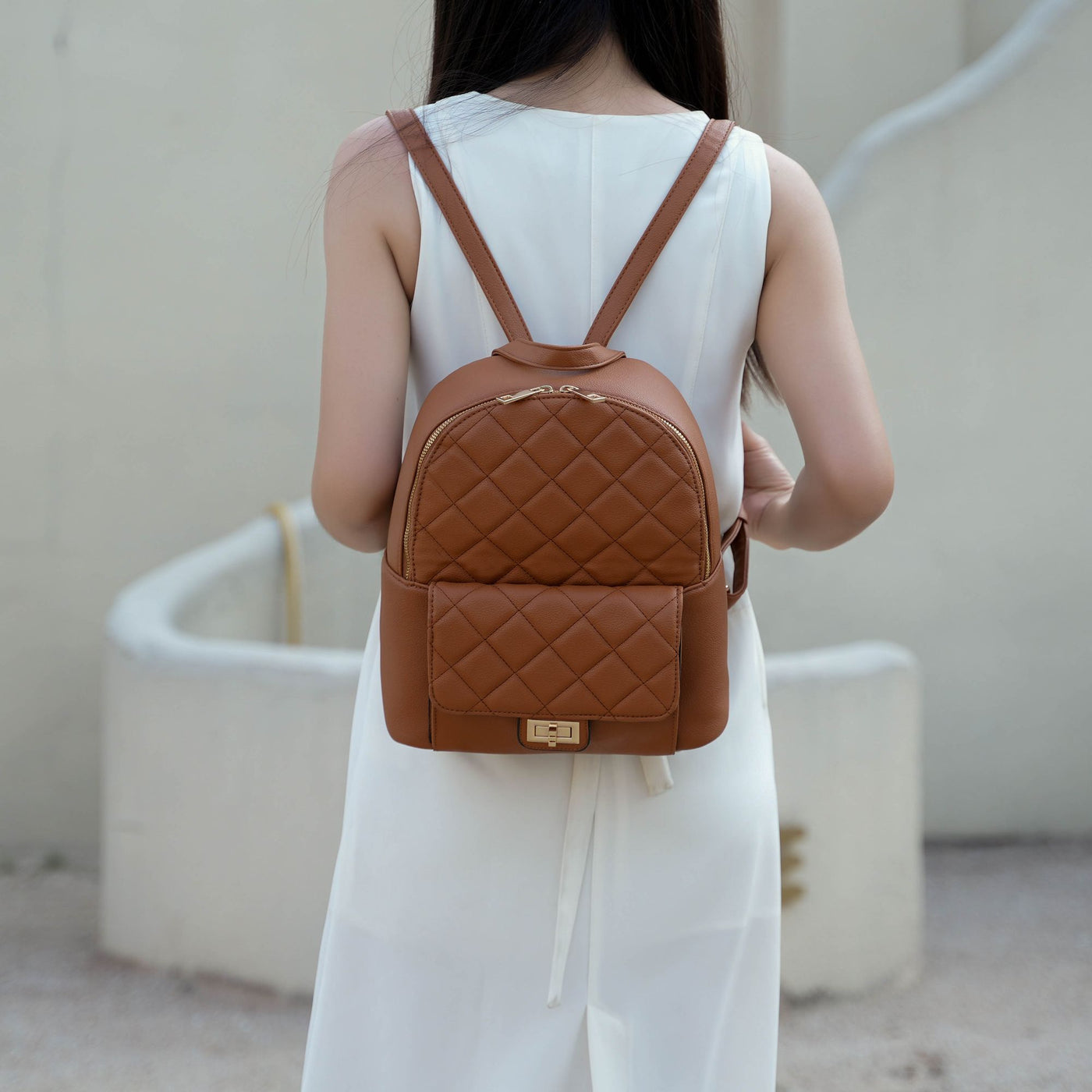 MKF Dimitria quilted backpack side view showing strap detail