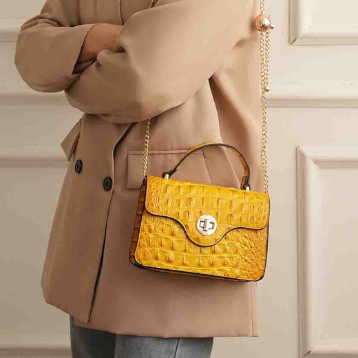 MKF Mae mini crossbody bag front view in Fuchsia