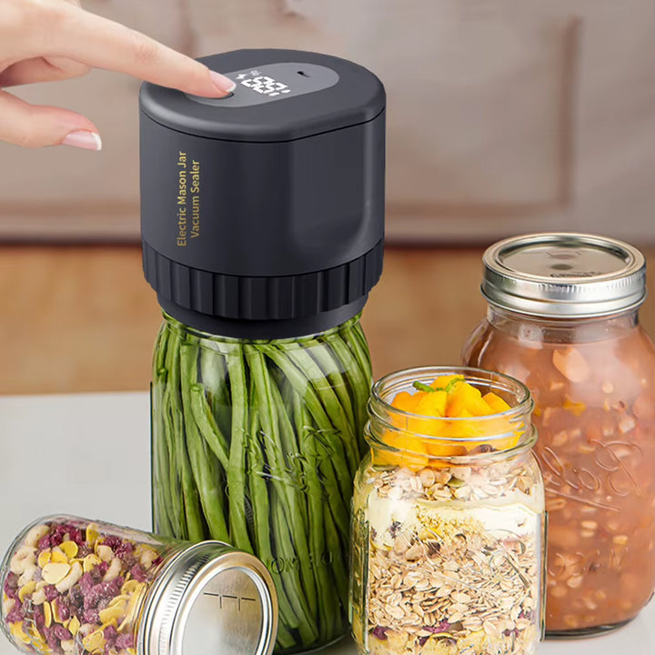 Top view of cordless vacuum sealer device for jars