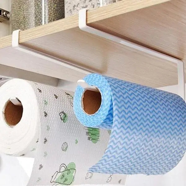 Holder shown dispensing a single sheet being torn off