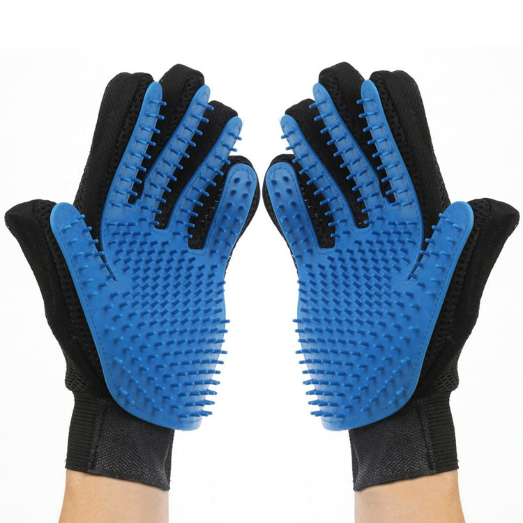 Deshedding glove used on a dog coat