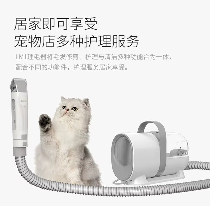 Pet grooming vacuum in use on a dog