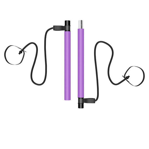 Pilates bar used for a row with handle attachments