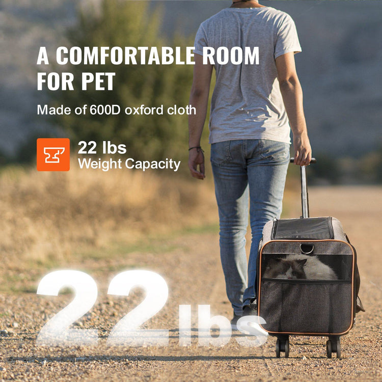 Grey rolling cat carrier with shoulder strap attached for hand carrying