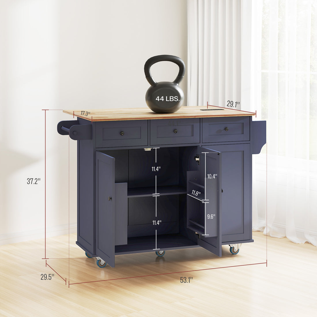 Dark blue kitchen island cart in an apartment kitchen
