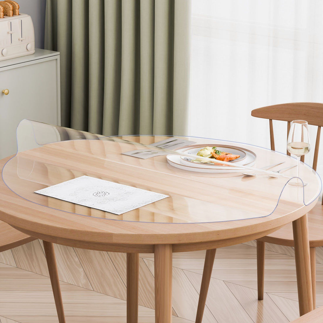 round clear PVC table protector size shown against round table