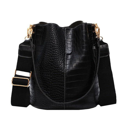 Single shoulder bucket handbag side profile shot