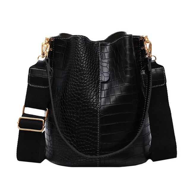 Single shoulder bucket handbag side profile shot