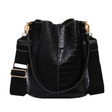 Single shoulder bucket handbag side profile shot