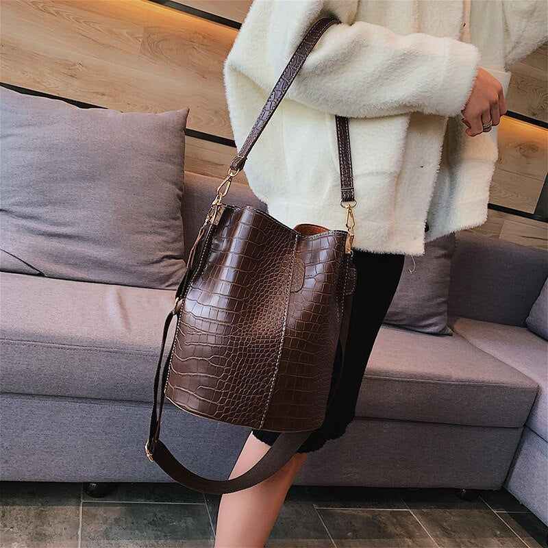 Single shoulder bucket bag shown in alternate colorway