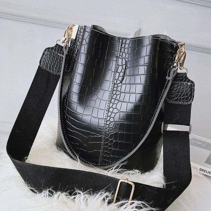 Single shoulder bucket bag close-up of front design