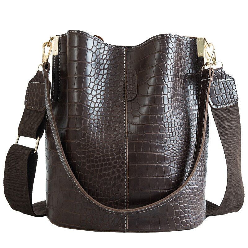 Single shoulder bucket bag styled with everyday outfit