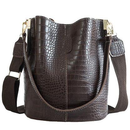 Single shoulder bucket bag styled with everyday outfit