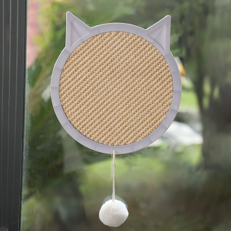 Cat scratching on sisal pad showing claw texture