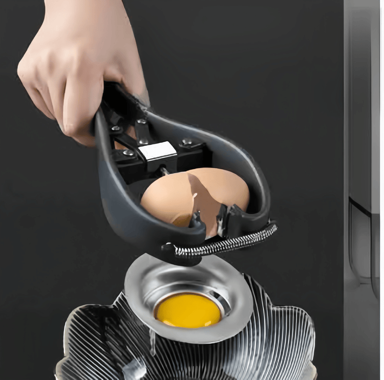 Stainless steel chicken egg separator tool positioned over a bowl with yolk and white shown mid-separation